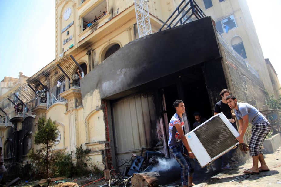 Egyptian protesters ransack the Muslim Brotherhood headquarters in Cairo on July 1.