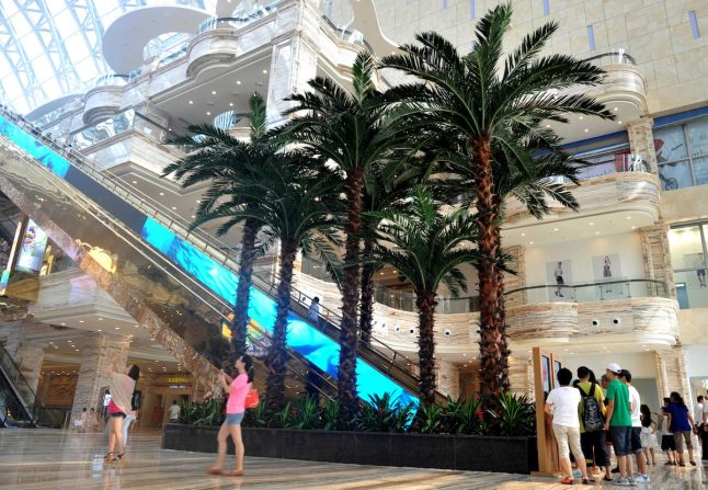 With 1.7 million square meters of floor space, the building is three times bigger than the Pentagon. It has more palm trees than the Pentagon too.
