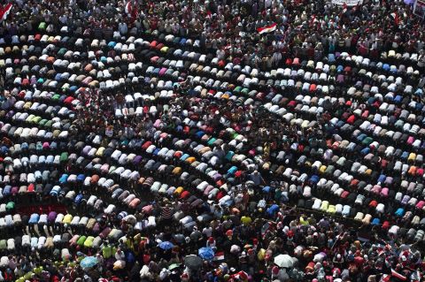 Thousands of opponents of Egyptian President Morsy pray during a protest calling for his ouster on Sunday, June 30. On the first anniversary of his inauguration, Morsy's Islamist supporters vow to defend his legitimacy to the end. 