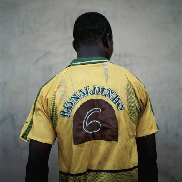 A player wears a hand-stitched Vento Inha FC shirt, in Pacasse, Mozambique, with the name of former Brazil international Ronaldinho emblazoned across the back.