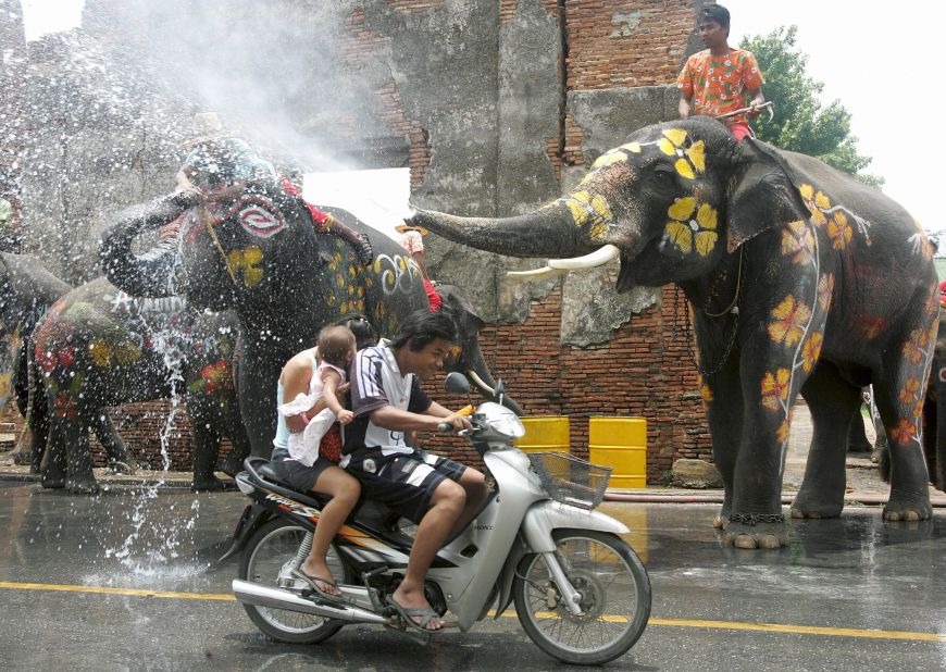 A water fight takes place every year during Songkran, the Thai New Year. Attendees splash each other, and some even break out the water pistol. Elephants -- who are especially effective at dousing water -- join in the fun as well.