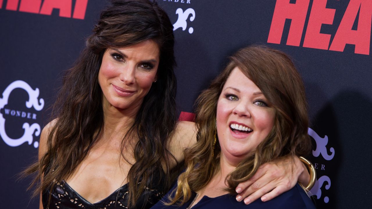 Hollywood actresses Sandra Bullock and Melissa McCarthy grace the red carpet at "The Heat" premiere. The film was a hit at the US box office this weekend grossing at total of $40 million.