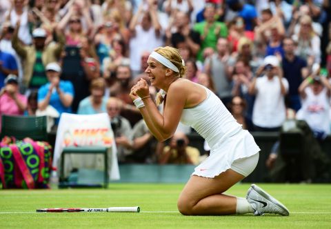 Germany's Sabine Lisicki celebrates after defeating World No.1 Serena Williams on Centre Court Monday. Lisicki prevailed 6-2 1-6 6-4 following an enthralling tussle.