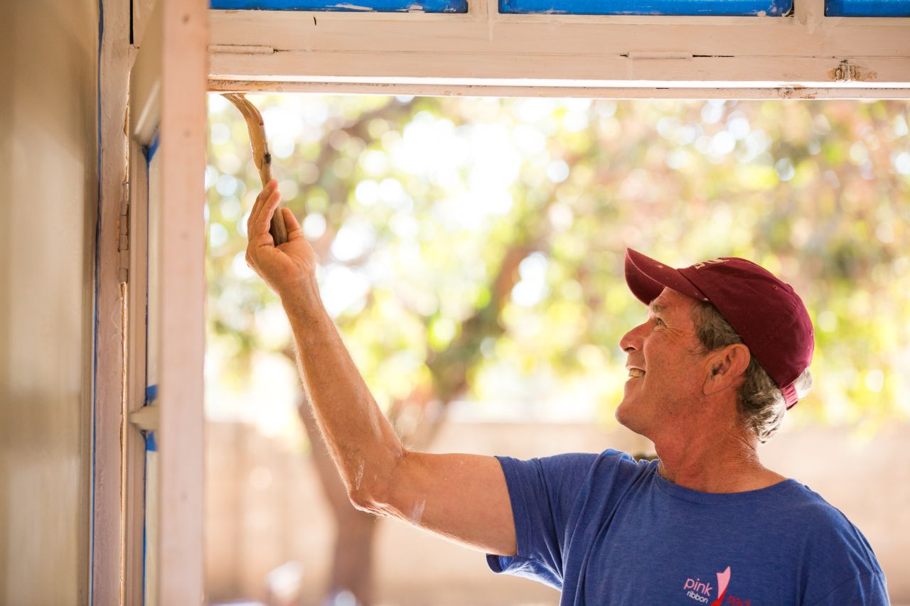 George W. Bush does some painting during renovations.