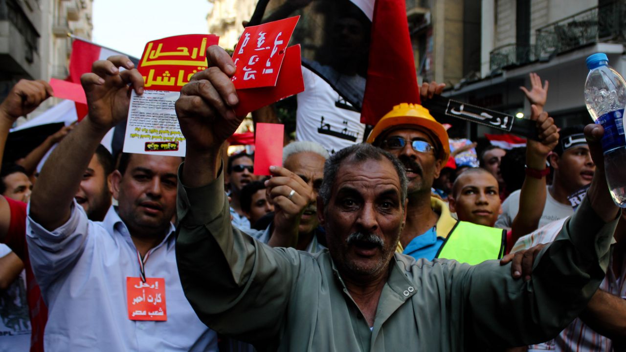 MahmoudGamal says on Friday, June 28, protests started throughout many parts of Egypt. In Tahrir Square, people gathered to demand the removal of the Muslim Brotherhood's regime. 'Protesters held posters and cards with just one word, "LEAVE,"' he said. While photographing the protesters, he felt as though there was a sense of rage within protesters. 'You could consider it a new wave of rage in this revolution,' he said. However, he does not support all of the protesters' demands. 'The current regime is losing its balance because of many reasons,' he explained, citing that the President has not met the demands of the people and costs of products like oil and food continue to increase. 'All of this led to rising aggression between a great percentage of the population. And because of that, I believe that the call for an early presidential election is fair enough,' he said. 