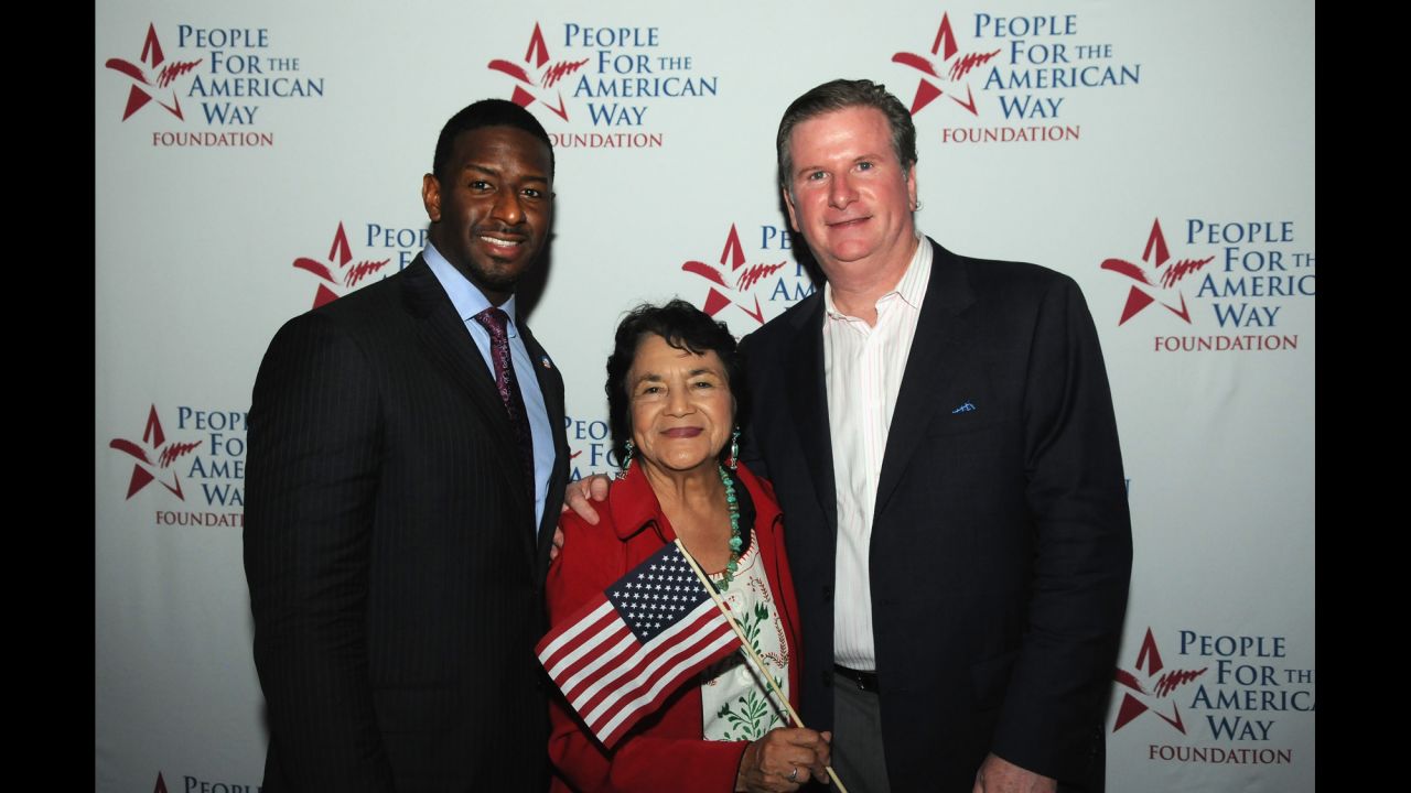 Huerta poses with Tallahassee City Commissioner Andrew Gillum and People for the American Way President Michael Keegan at the DNC on September 4, 2012, in Charlotte, North Carolina.