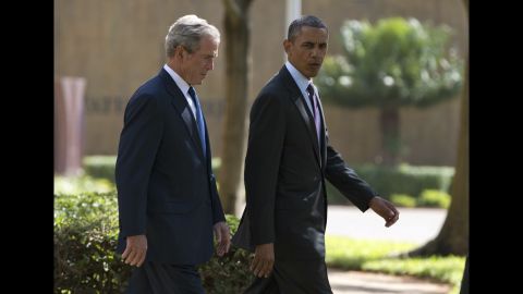 Former President George W. Bush joins Obama during a July 2 wreath-laying ceremony in Dar es Salaam to honor the victims of the 1998 terror attack at the U.S. Embassy in Tanzania. 