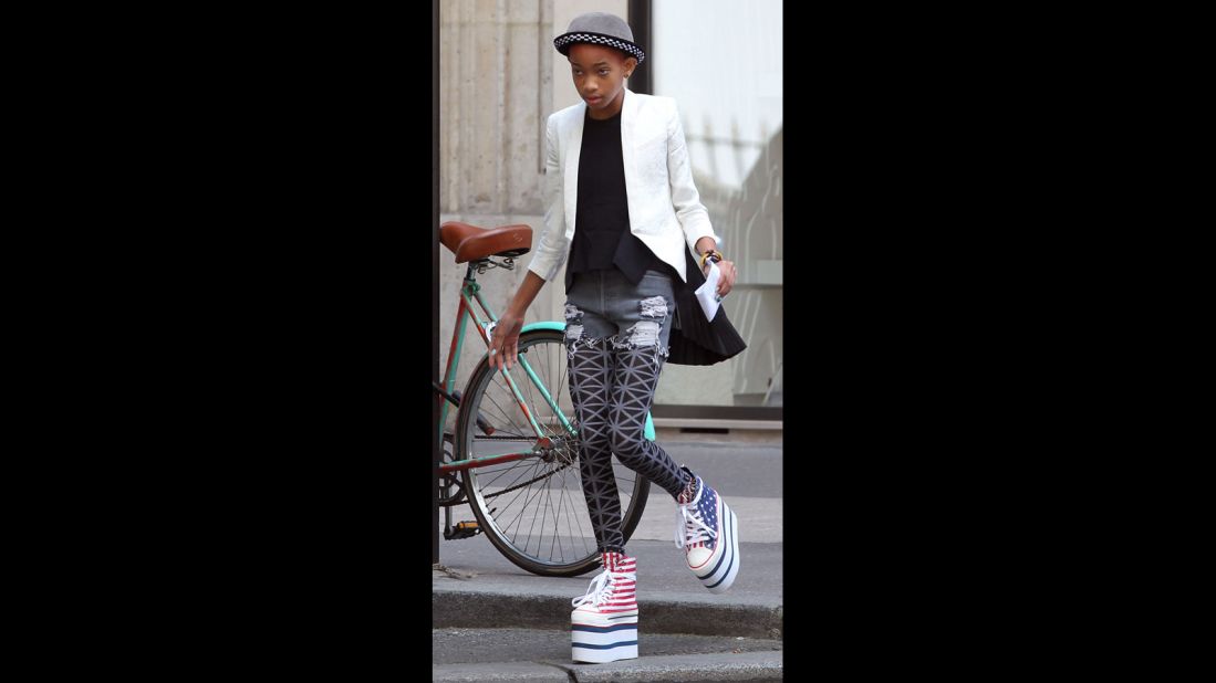 Willow Smith keeps her balance atop a serious pair of Americana-inspired platforms while in France in May 2012.