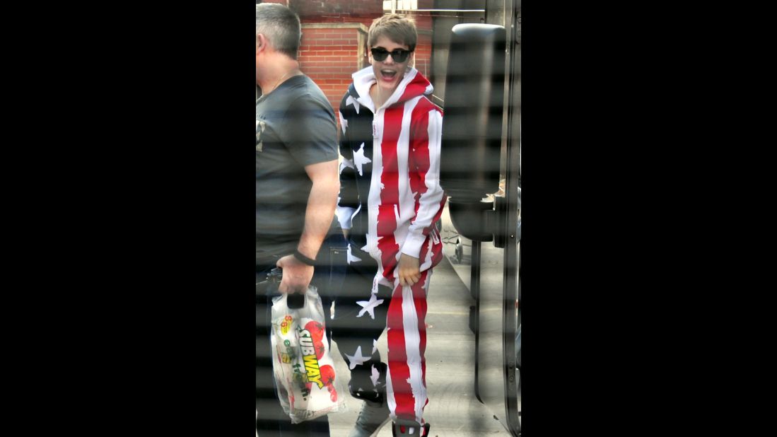 Justin Bieber may be Canadian, but this technicality didn't stop the teen idol from appearing from head to toe in an American flag-style outfit in Nottingham, England, in March 2011.