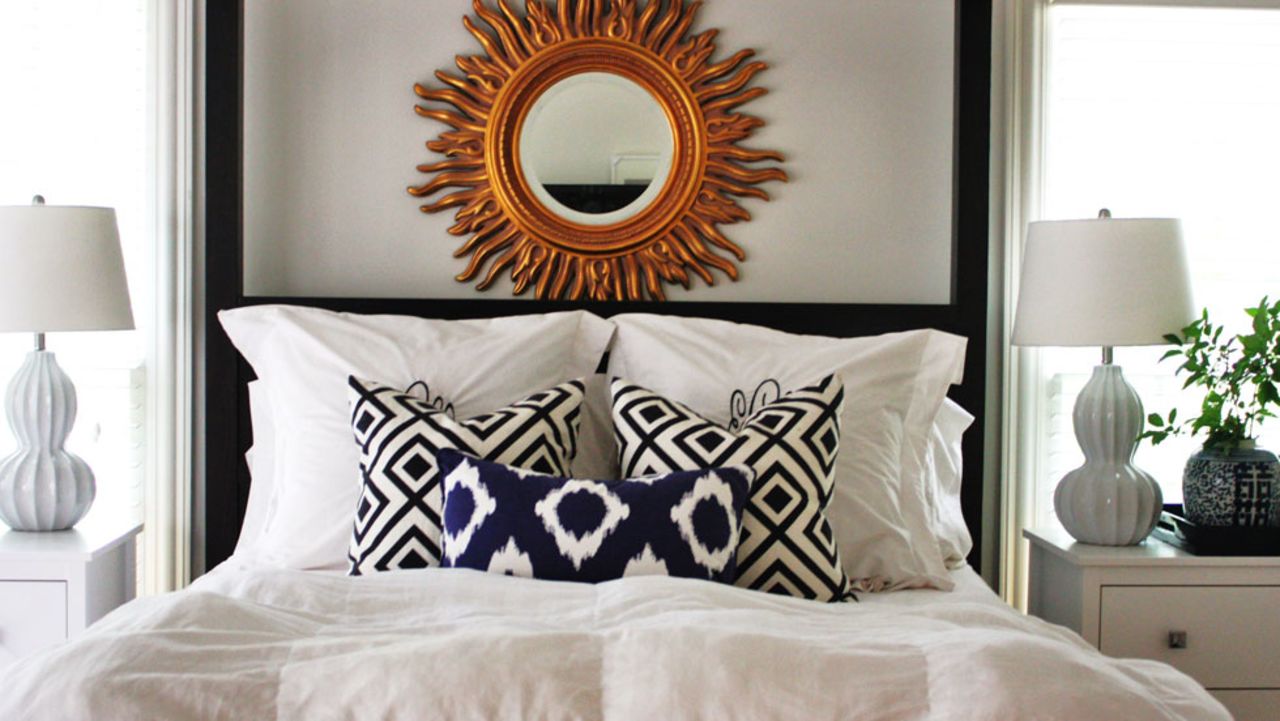 <a href="http://ireport.cnn.com/docs/DOC-996375">Emily Clark</a> from Charlotte, North Carolina, likes to keep her bedroom simple. Calming yet fresh white walls and sheets allows her to give her busy mind a rest. To see where the room started and it's slow-but-steady progress, <a href="http://emilyaclark.blogspot.com/2012/04/glimpse-at-our-master-bedroom.html" target="_blank" target="_blank">check out her blog</a>.