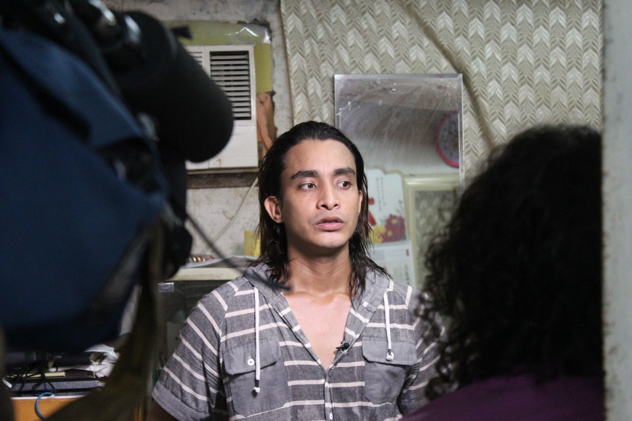 Arif, a 26-year old refugee from Bangladesh, sits for an interview with CNN reporters in the slum of Ping Che on June 25, 2013. Arif, formerly a pharmacology student and business owner, fled his native country in 2009 when terrorists threatened to kill him. "I lost everything," he says.