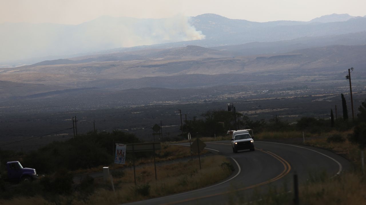 Smoke from the Yarnell Hill Fire is visible from a distance on a road to Yarnell on Monday, July 1.