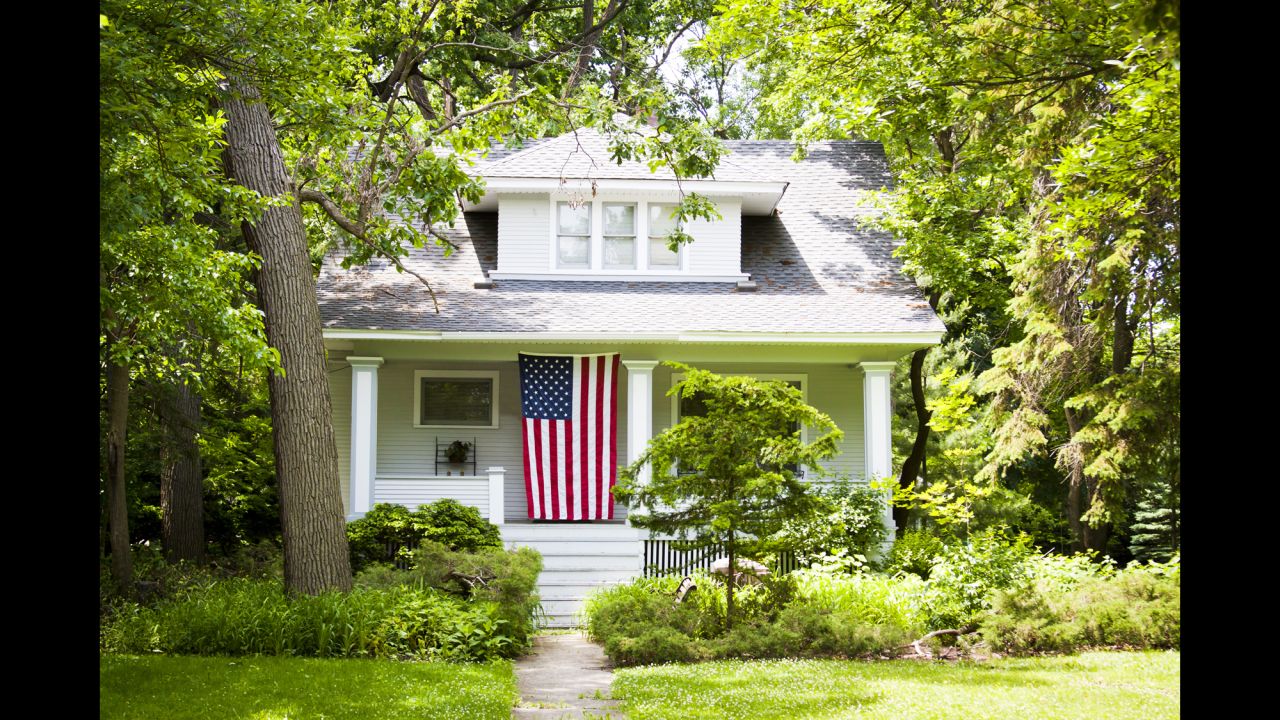 When hanging a flag against a wall, in a window or suspended across an entrance, whether horizontally or vertically, the Flag Code says "the union should be uppermost and to the flag's own right, that is, to the observer's left." However, the flag should never be used to cover a ceiling.