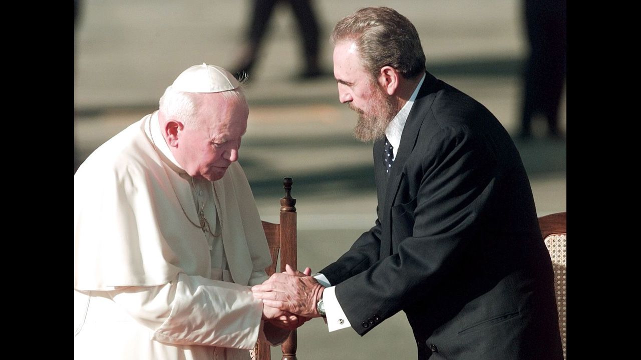 Cuban leader Fidel Castro greets the pope in Cuba in January 1998. John Paul II was the first pontiff to visit the Caribbean island nation.