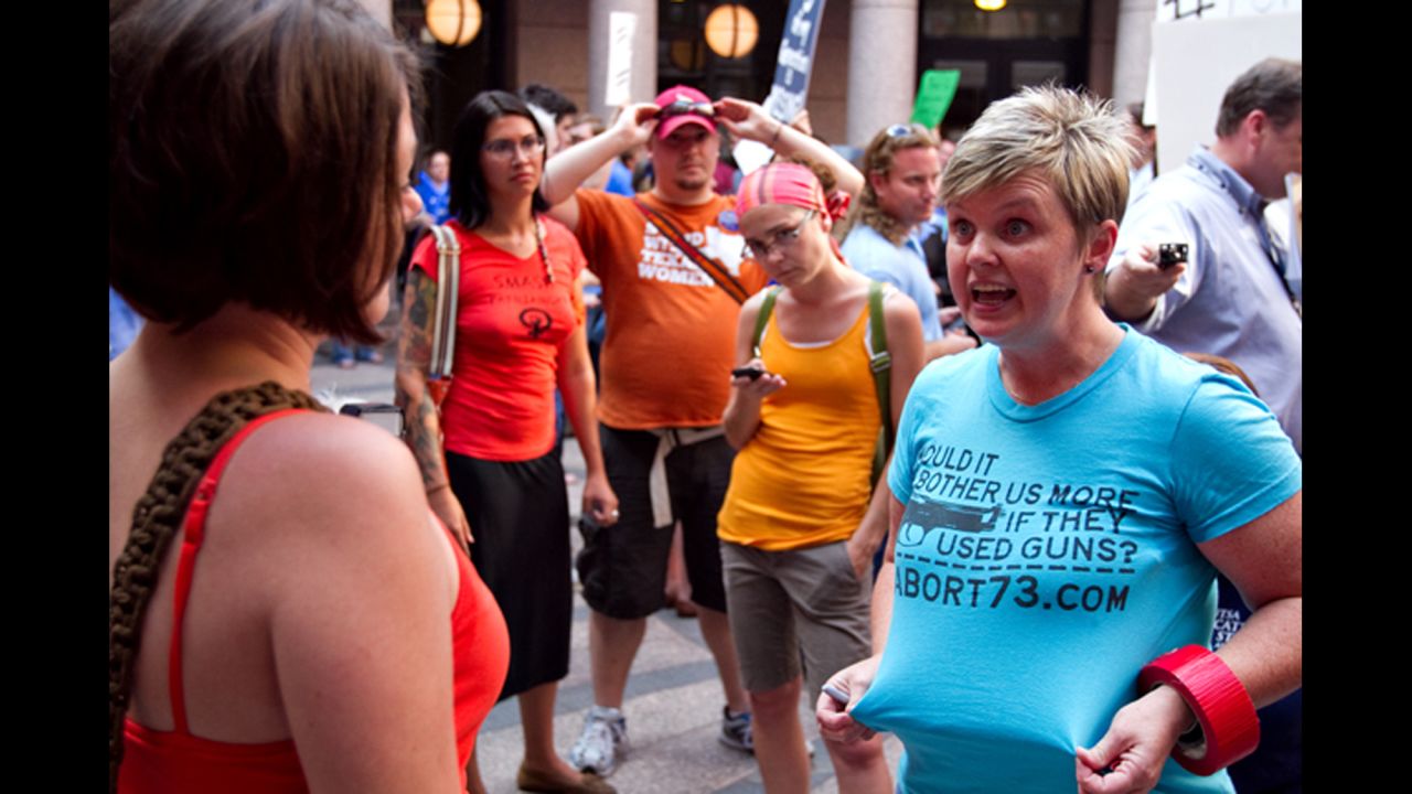 Anti-abortion activist Pamela Whitehead, right, argues with an abortion-rights activist in July 2013.
