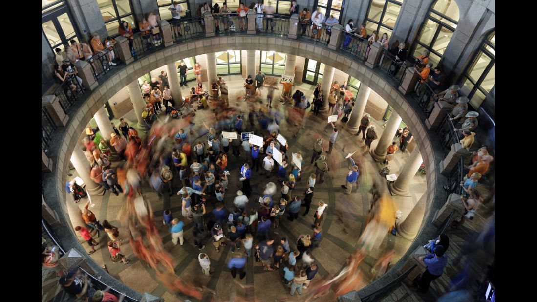 Texas has long been a hotbed of abortion protests, but the issue drew national attention in 2013 when new abortion restrictions were debated and then passed in the legislature. Above, opponents of the measure walk around supporters at the Capitol. 