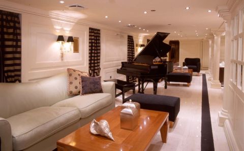 The luxury lounge area still has the original piano where Maria Callas and Frank Sinatra would entertain guests.