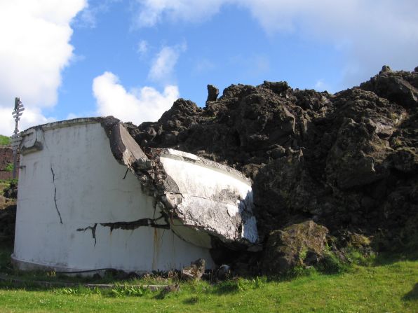 The town of Vestmannaeyjar was saved from Eldfell's lava by using sea-water to stop the flow, but not all structures survived.
