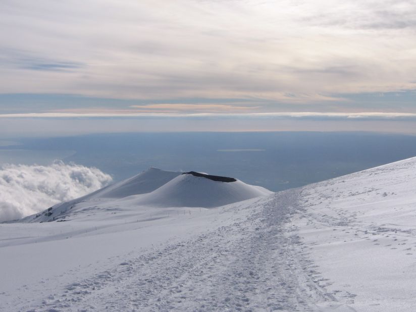 Mount Etna's vent is sometimes topped with snow during the winter. 