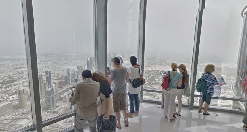 Visitors captured by Google's 360 degree Street View camera look out from the world's highest observation deck.