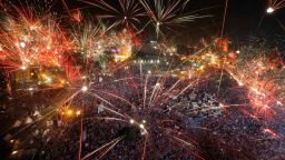 Fireworks light the sky opponents of Egypt's Islamist President Mohammed Morsi celebrate in Tahrir Square in Cairo, Egypt, Wednesday, July 3, 2013. A statement on the Egyptian president's office's Twitter account has quoted Mohammed Morsi as calling military measures "a full coup." The denouncement was posted shortly after the Egyptian military announced it was ousting Morsi, who was Egypt's first freely elected leader but drew ire with his Islamist leanings. The military says it has replaced him with the chief justice of the Supreme constitutional Court, called for early presidential election and suspended the Islamist-backed constitution.(AP Photo/Amr Nabil)