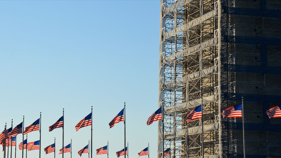 The Washington Monument is closed for repairs following the 2011 earthquake in DC, but the ring of flags still fly.