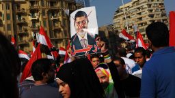 Cairo protest anti-Morsy sign.gi