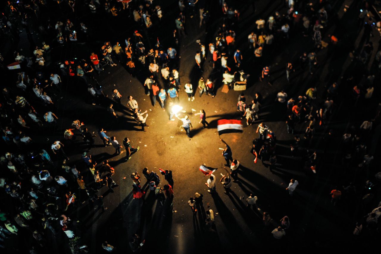 Protesters celebrate near Egypt's Presidential Palace in Cairo on July 3.