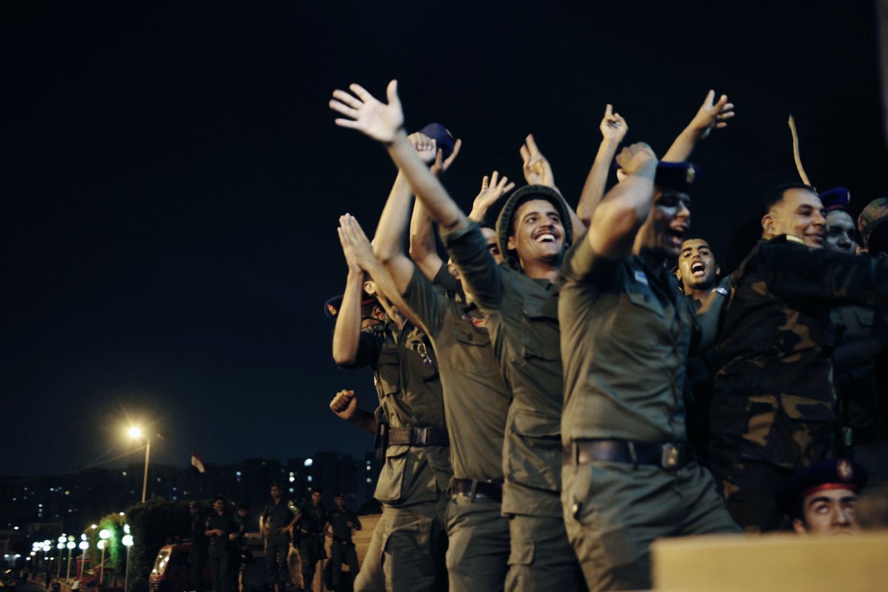 Officers of the Egyptian Republican Guard celebrate at their headquarters in Nasr City on July 3.