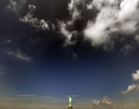 Clouds roll in over the Statue of Liberty in 2008.