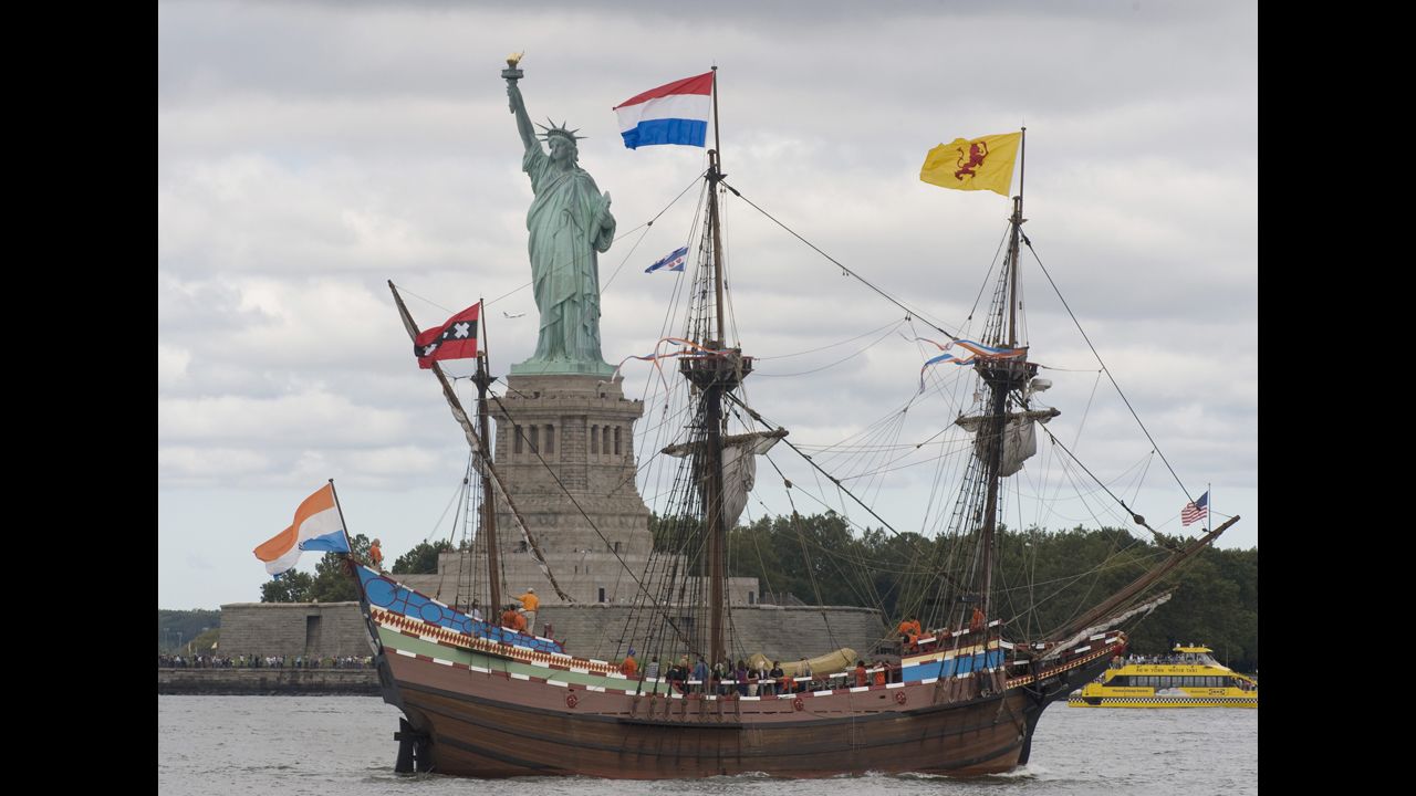 A replica of the Dutch ship Half Moon sails past the Statue of Liberty in September 2009, commemorating Henry Hudson's entry into New York Harbor in 1609.