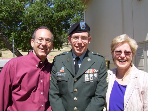 Daniel and his parents, Howard and Jean, celebrate Daniel's graduation from the Defense Language Institute in 2005. After his first deployment to Iraq, Daniel wanted to study Arabic to increase his skill set as an intelligence officer.