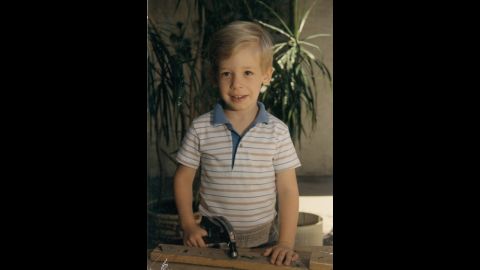 Daniel at age 5. His family said that as a child, he was always interested in music and loved the piano. At age 12, he wrote his first song on the guitar.