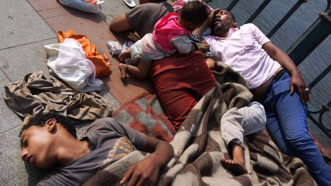 A family sleeps on a bridge near Tahrir Square on July 4.