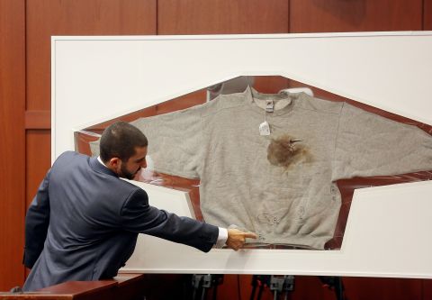 Florida Department of Law Enforcement Crime Lab Analyst  Anthony Gorgone testifies about DNA findings on Wednesday, July 3, in Sanford, Florida. Here, Gorgone points to a sweatshirt worn by Trayvon Martin on the night Martin was shot. Only one stain on Martin's hooded jacket yielded a partial DNA profile that matched Zimmerman's.