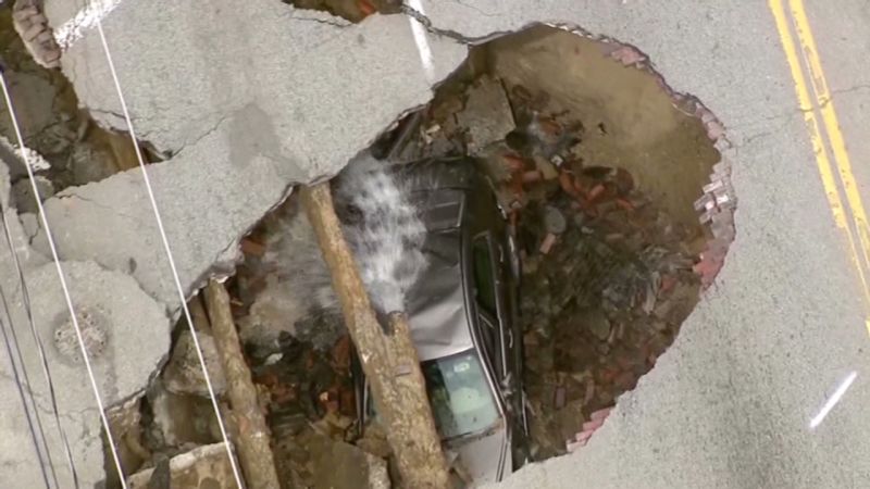 Woman falls in sinkhole, prays to Jesus to get out | CNN