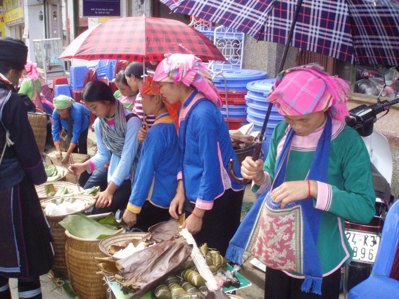 Vietnamese women sell rice at a market stall. The country has now become the second biggest rice exporter in the world.