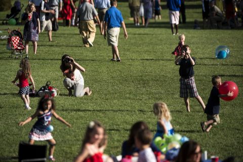 Children play on the South Lawn of the White House on the Fourth of July. President Barack Obama and the first family hosted members of the U.S. armed services and their families to celebrate the 237th anniversary of the counry's independence from the British Empire.