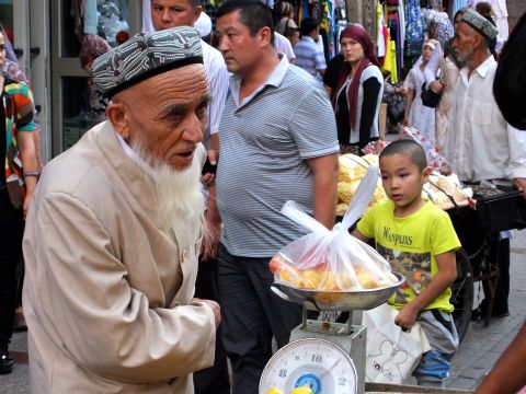 Uyghurs are very distinctive from Han Chinese -- they have their own language, food, religion and customs.