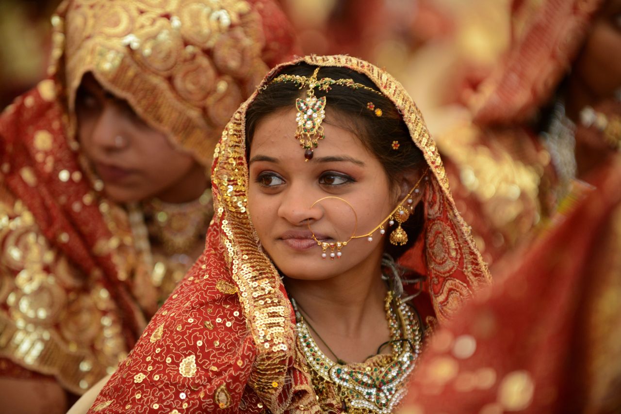 An Indian Muslim bride during a mass wedding ceremony at the ancient Sarkhej Roja in Ahmedabad. 