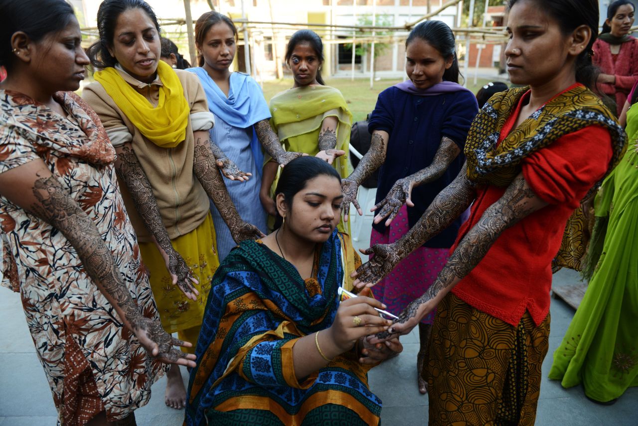 Farzana Shaikh applies henna to visually impaired brides at the Andh Kanya Prakash Gruh institute as part of a ritual ahead of their marriages in Ahmedabad, India. 