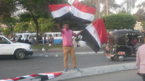 Freelance journalist <a href="http://ireport.cnn.com/docs/DOC-999156">Erica Charves</a> captured this street scene July 2 as protests against Morsy gathered momentum. 