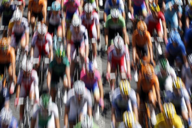 JULY 5 - MONTPELIER AND ALBI, FRANCE: The pack rides during the 205.5 km seventh stage of the <a href="http://cnn.com/2013/06/28/worldsport/gallery/tour-de-france-in-pics">100th edition of the Tour de France </a>cycling race on July 5 between Montpellier and Albi, southwestern France. <a href="http://cnn.com/2013/07/04/sport/cycling-tour-impey-greipel-cavendish/?hpt=hp_bn2">Daryl Impey </a>became the first South African to don the famous yellow jersey as Andre Greipel powered to his first stage win. 