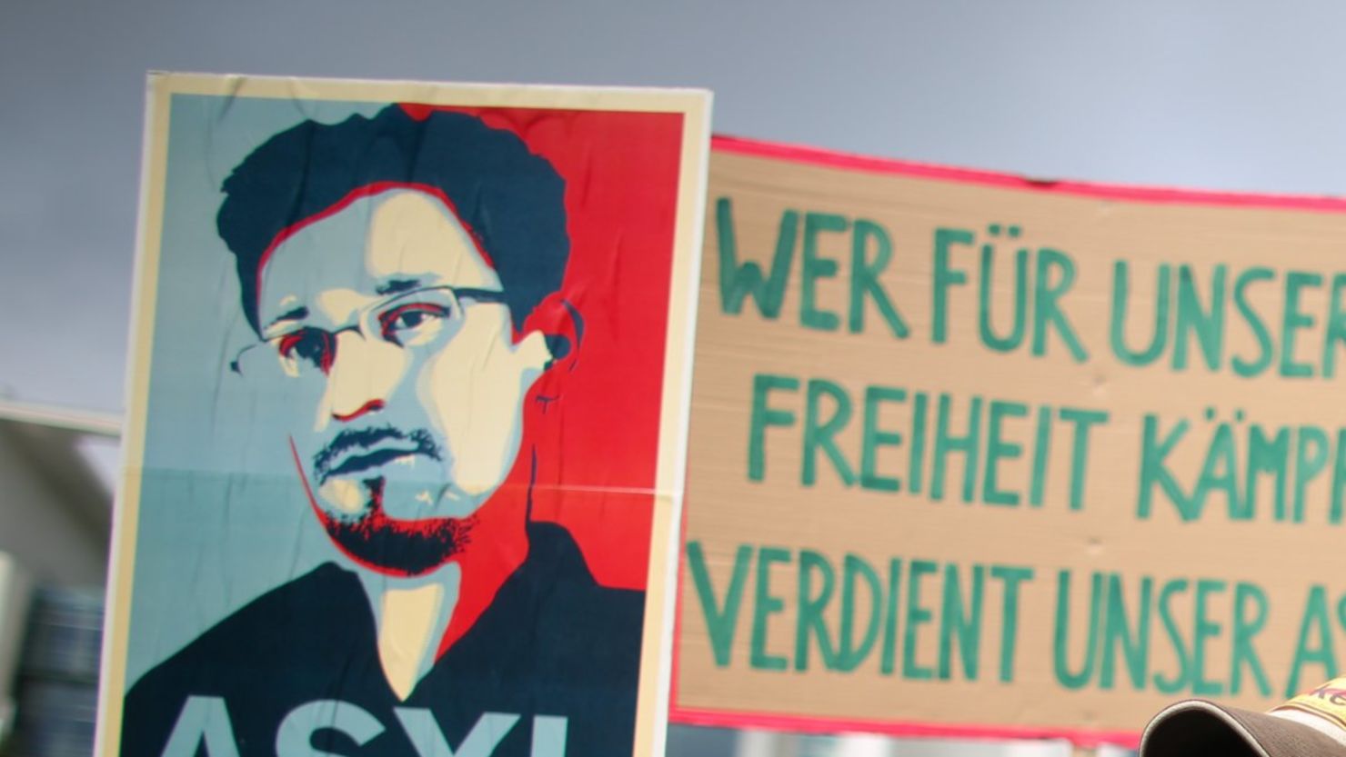 Activists demonstrate on July 4 in front of the German Chancellery in Berlin in support of granting Edward Snowden asylum.
