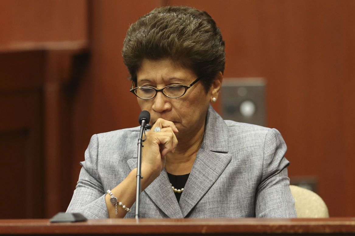 George Zimmerman's mother, Gladys Zimmerman, listens to the 911 tape while taking the stand during his trial in Seminole County circuit court on July 5.