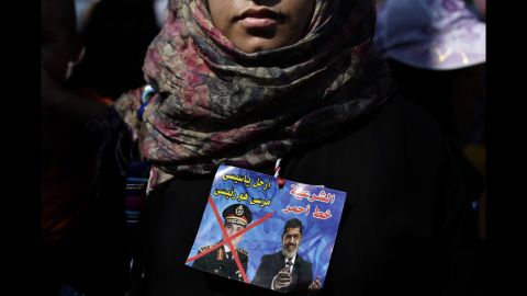 A Morsy supporter joins protests near the University of Cairo in Giza on July 6.