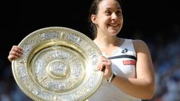 Marion Bartoli with the Venus Rosewater Dish. The 28-year-old claimed her first Grand Slam singles title with victory over Germany's Sabine Lisicki at Wimbledon on Saturday.  