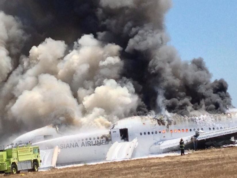 A photo provided to CNN by Eunice Bird Rah -- and shot by her father, who was a passenger on the plane -- shows flames and smoke bursting out of many of the aircraft's windows.