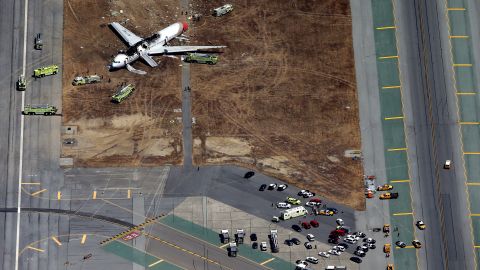 Rescue workers tend to the crash site on July 6.