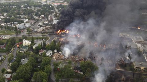 Smoke billows from a fire at the site of a train derailment on Saturday, July 6.
